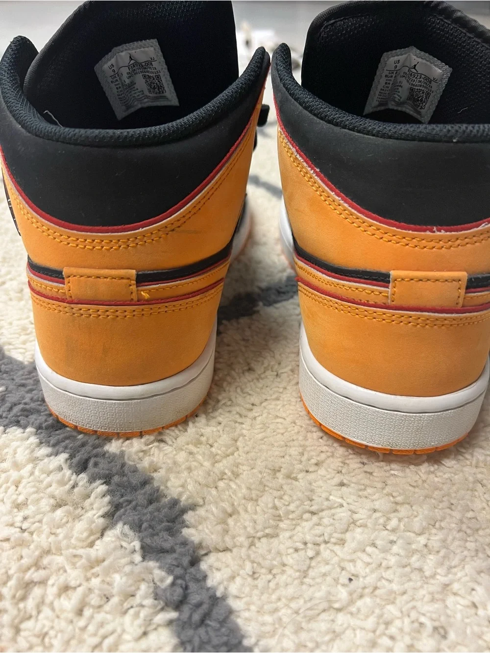 Air Jordan Orange High-Top Sneakers with Black Trim